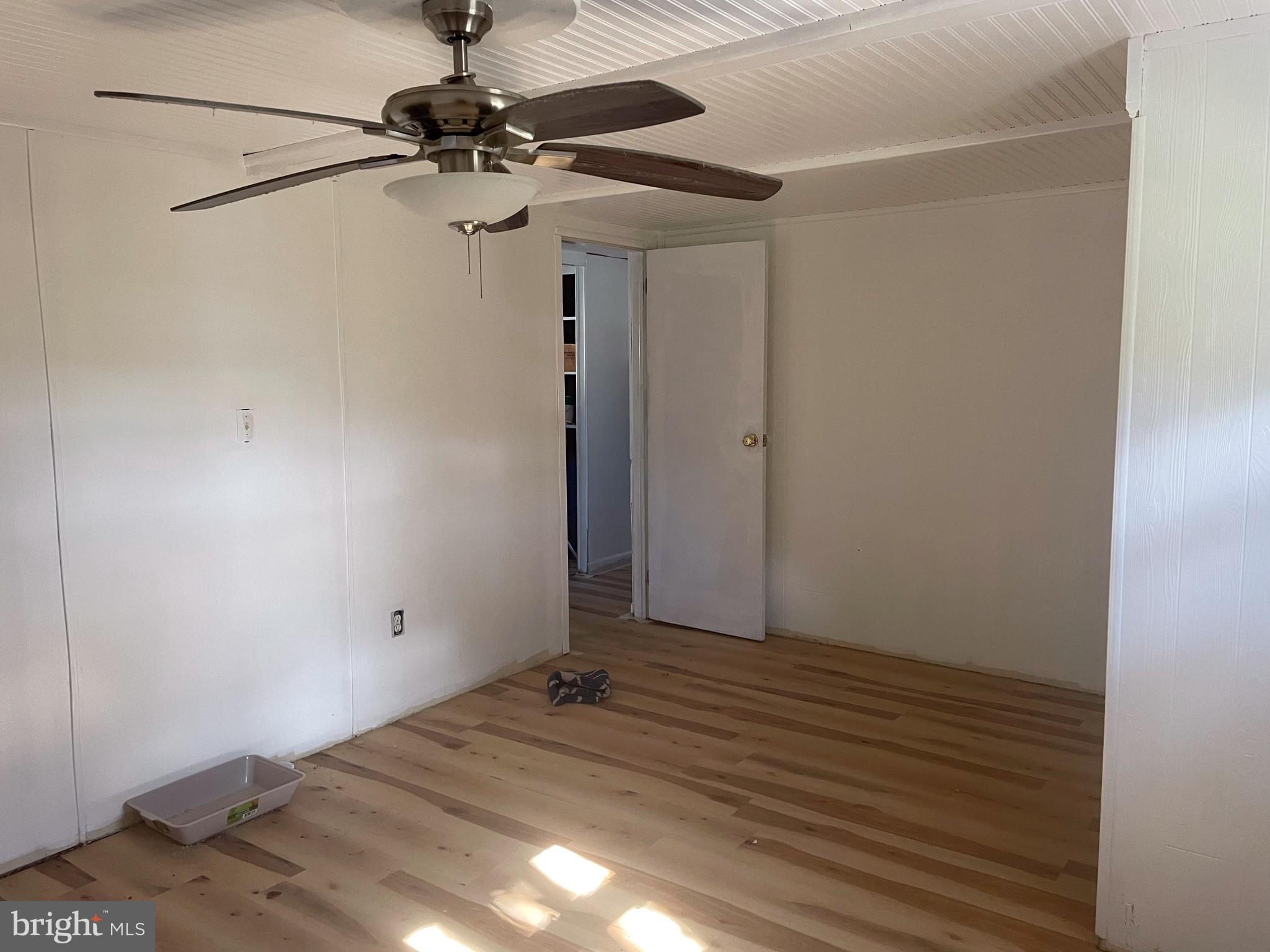 161 Pepple Road East Freedom, PA 16637 - Photo 12 of 14 a view of a room with a fan and a ceiling fan