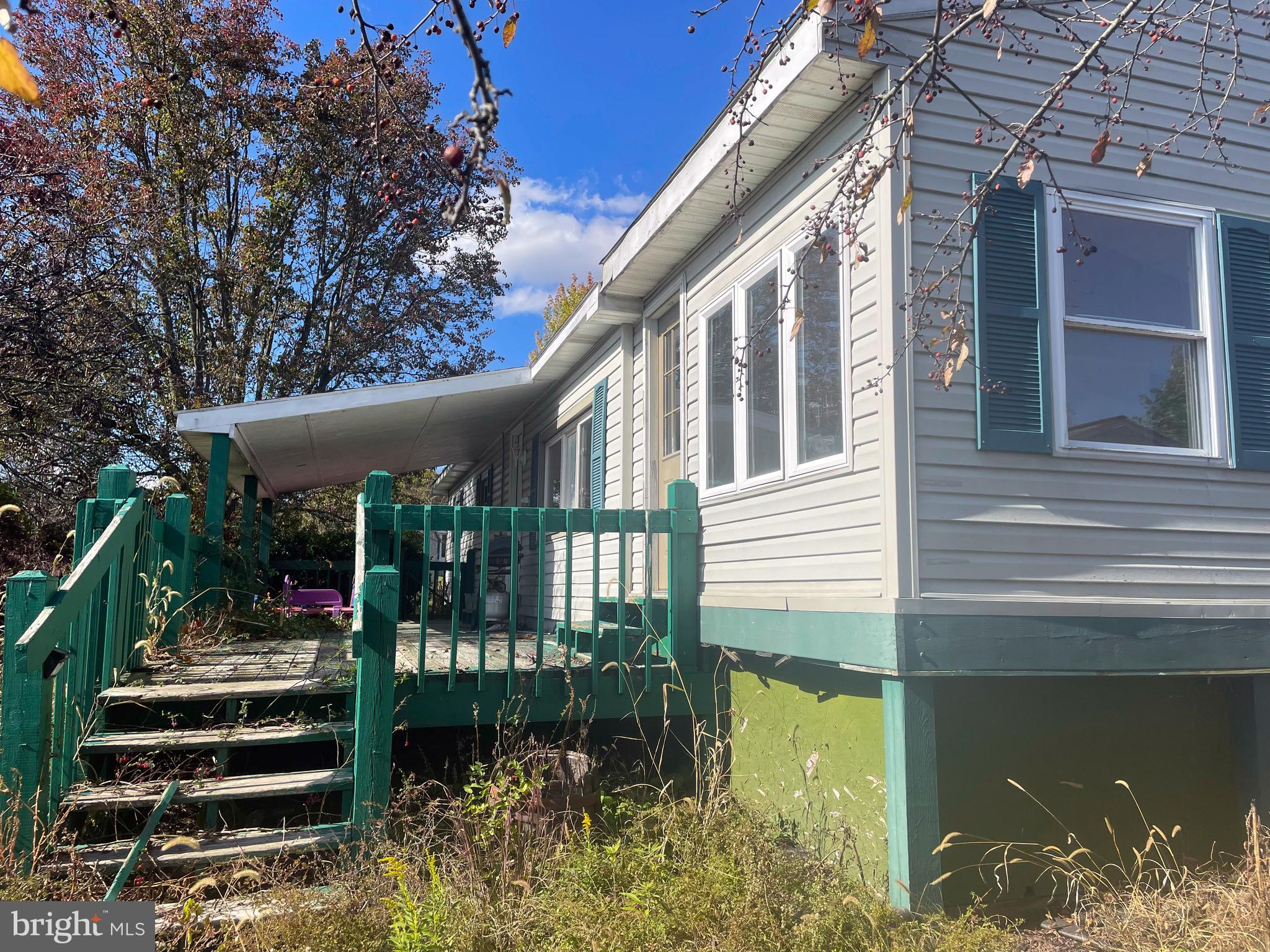 161 Pepple Road East Freedom, PA 16637 - Photo 3 of 14 a view of a house with a balcony