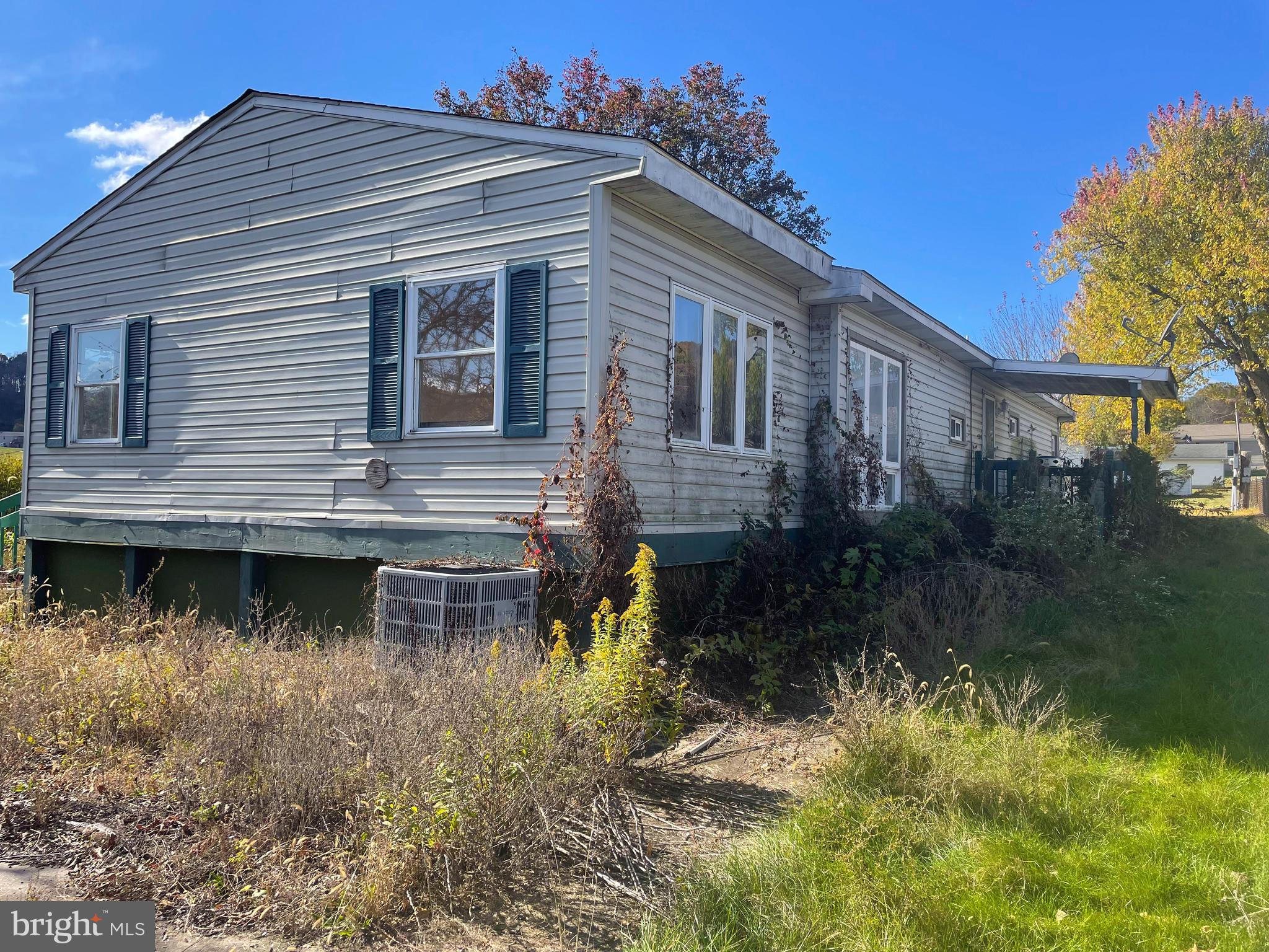 161 Pepple Road East Freedom, PA 16637 - Photo 4 of 14 a view of a house with a yard from a lake view