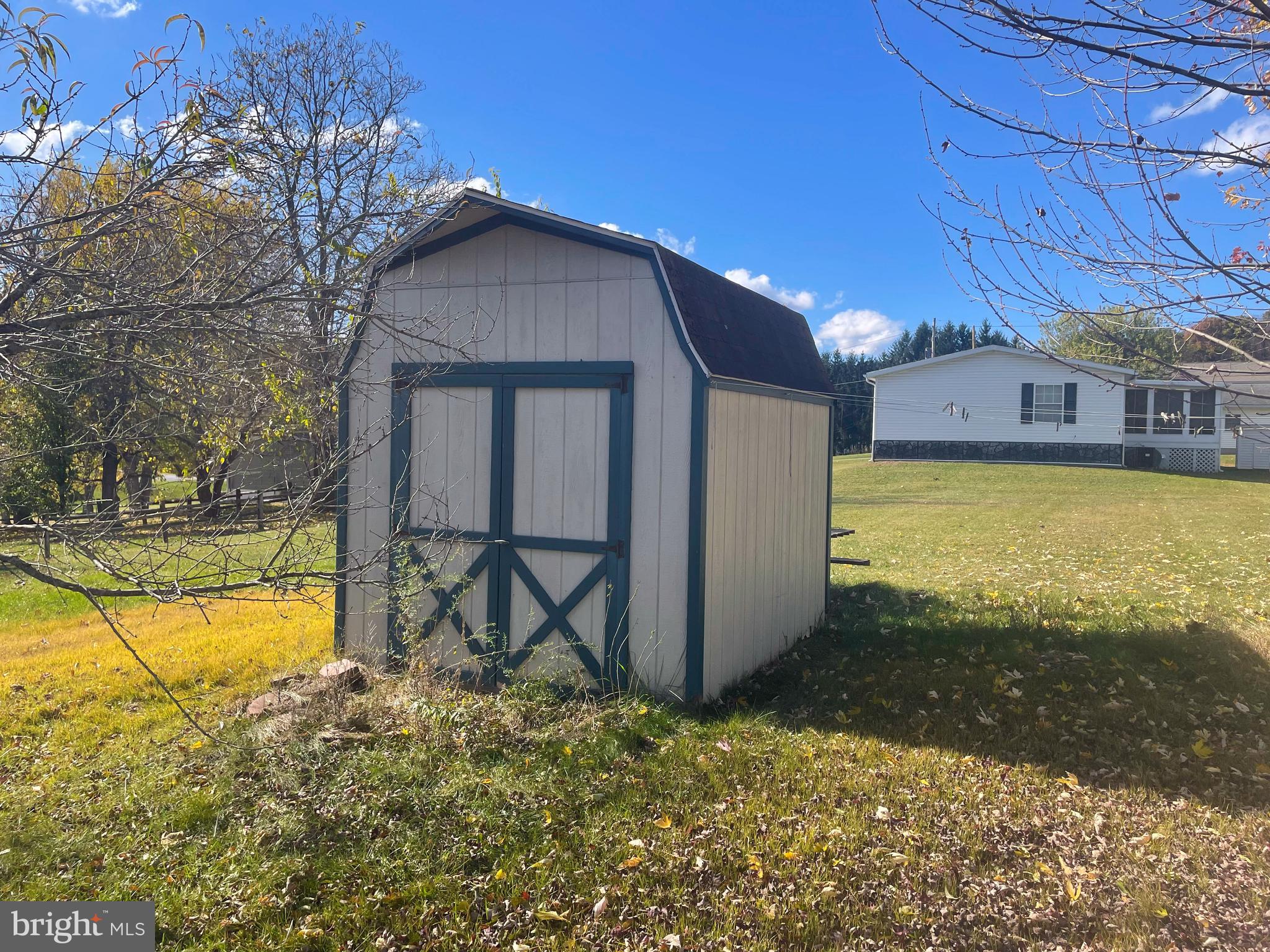 161 Pepple Road East Freedom, PA 16637 - Photo 7 of 14 a view of a house with backyard and swimming pool