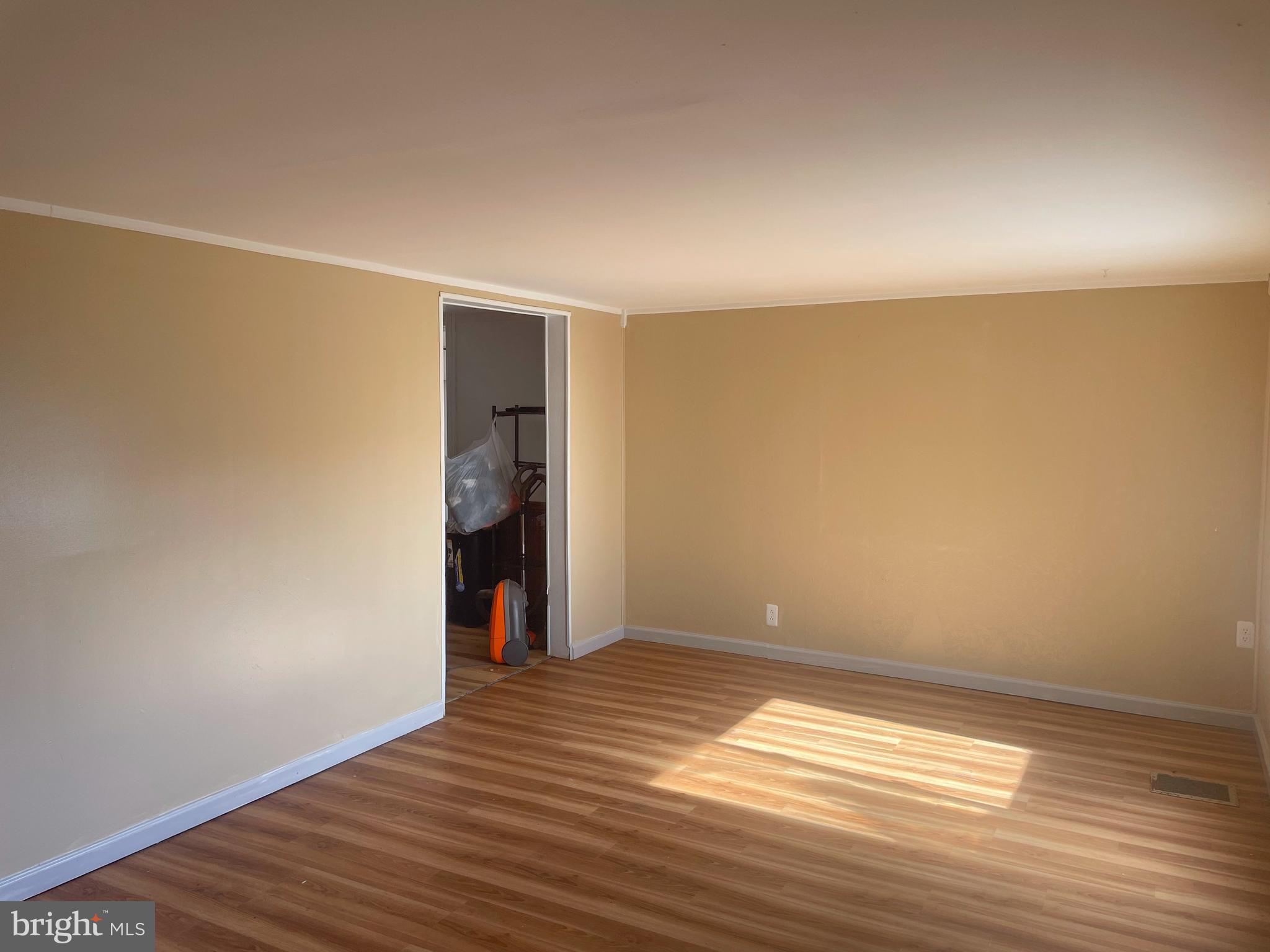 161 Pepple Road East Freedom, PA 16637 - Photo 9 of 14 a view of empty room with wooden floor