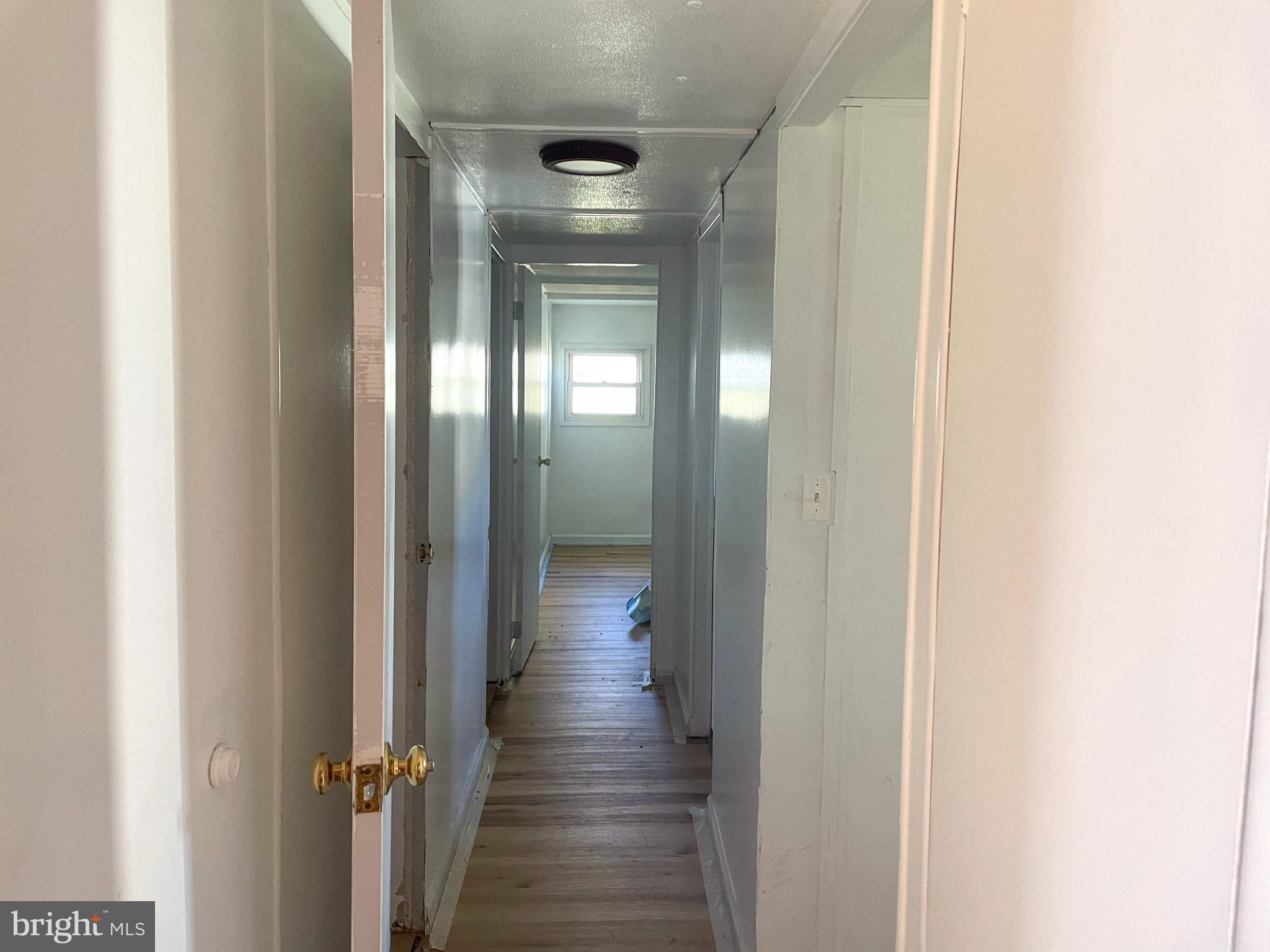 161 Pepple Road East Freedom, PA 16637 - Photo 10 of 14 a view of a hallway with wooden floor