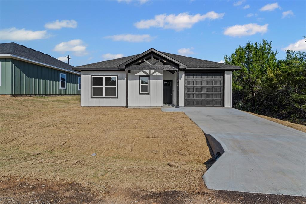 3400 Hilltop Road Granbury, TX 76048 - Photo 3 of 40 a view of a house with a yard and potted plants