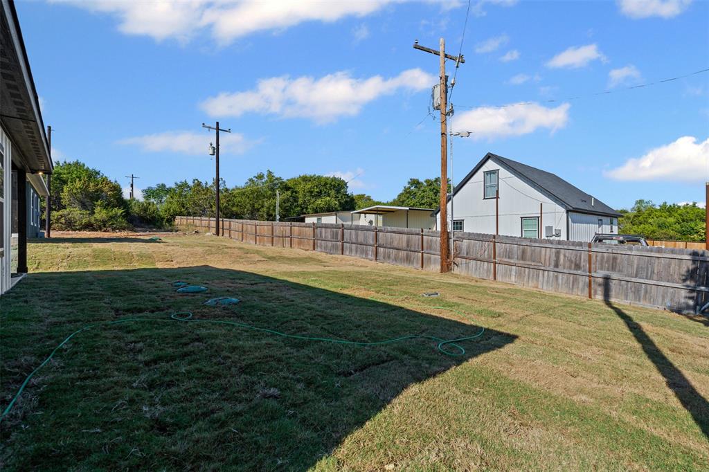 3400 Hilltop Road Granbury, TX 76048 - Photo 36 of 40 a view of a backyard