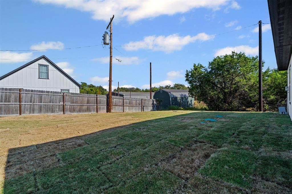 3400 Hilltop Road Granbury, TX 76048 - Photo 37 of 40 a view of a garden with a big yard