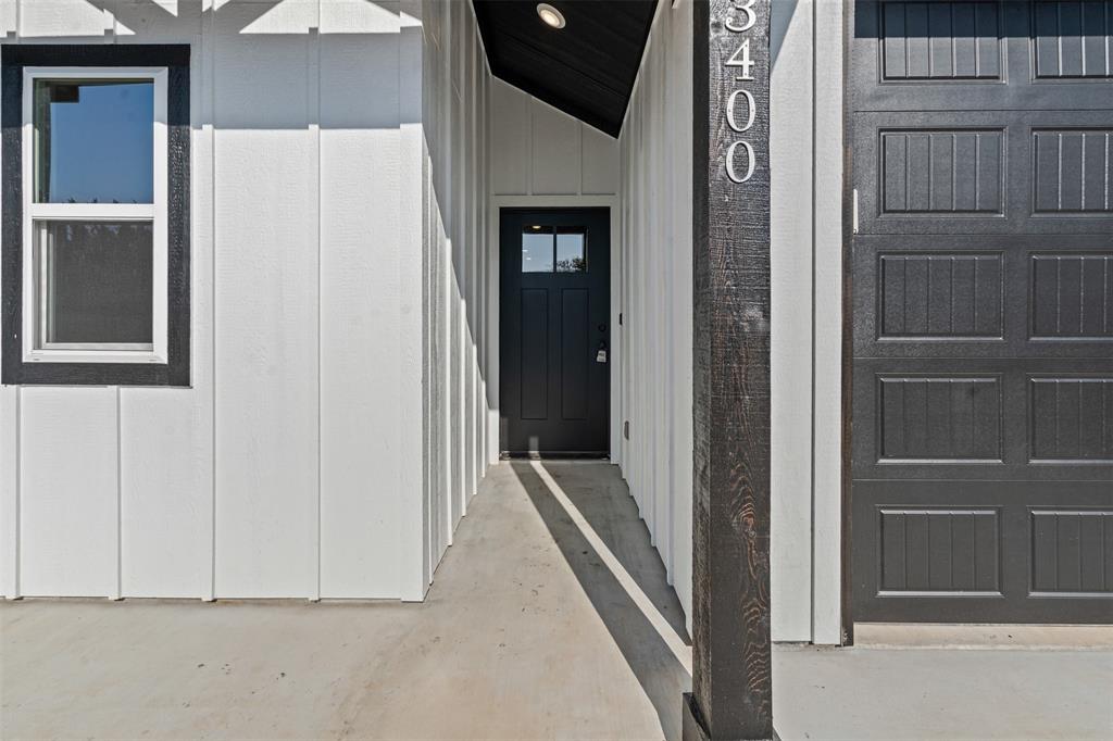 3400 Hilltop Road Granbury, TX 76048 - Photo 7 of 40 a view of a hallway with entryway door