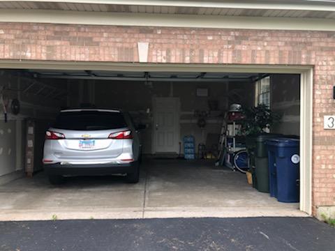 347 Emerald Lane, Unit 347 Algonquin, IL 60102 - Photo 11 of 11 a view of car parked in garage