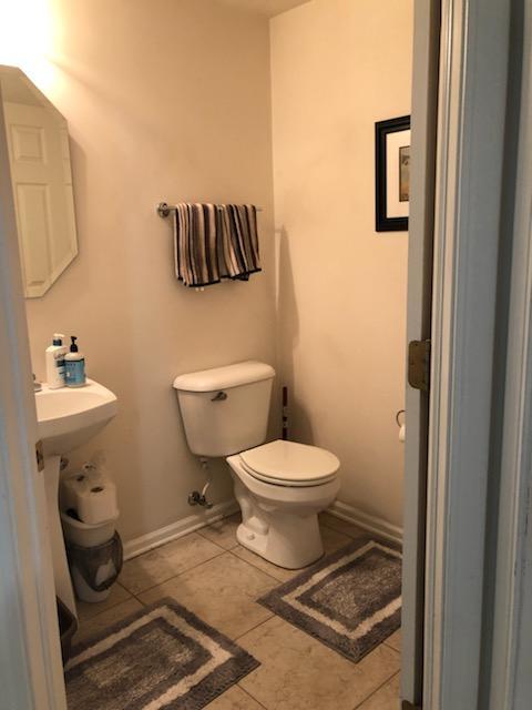 347 Emerald Lane, Unit 347 Algonquin, IL 60102 - Photo 7 of 11 a bathroom with a toilet and a sink