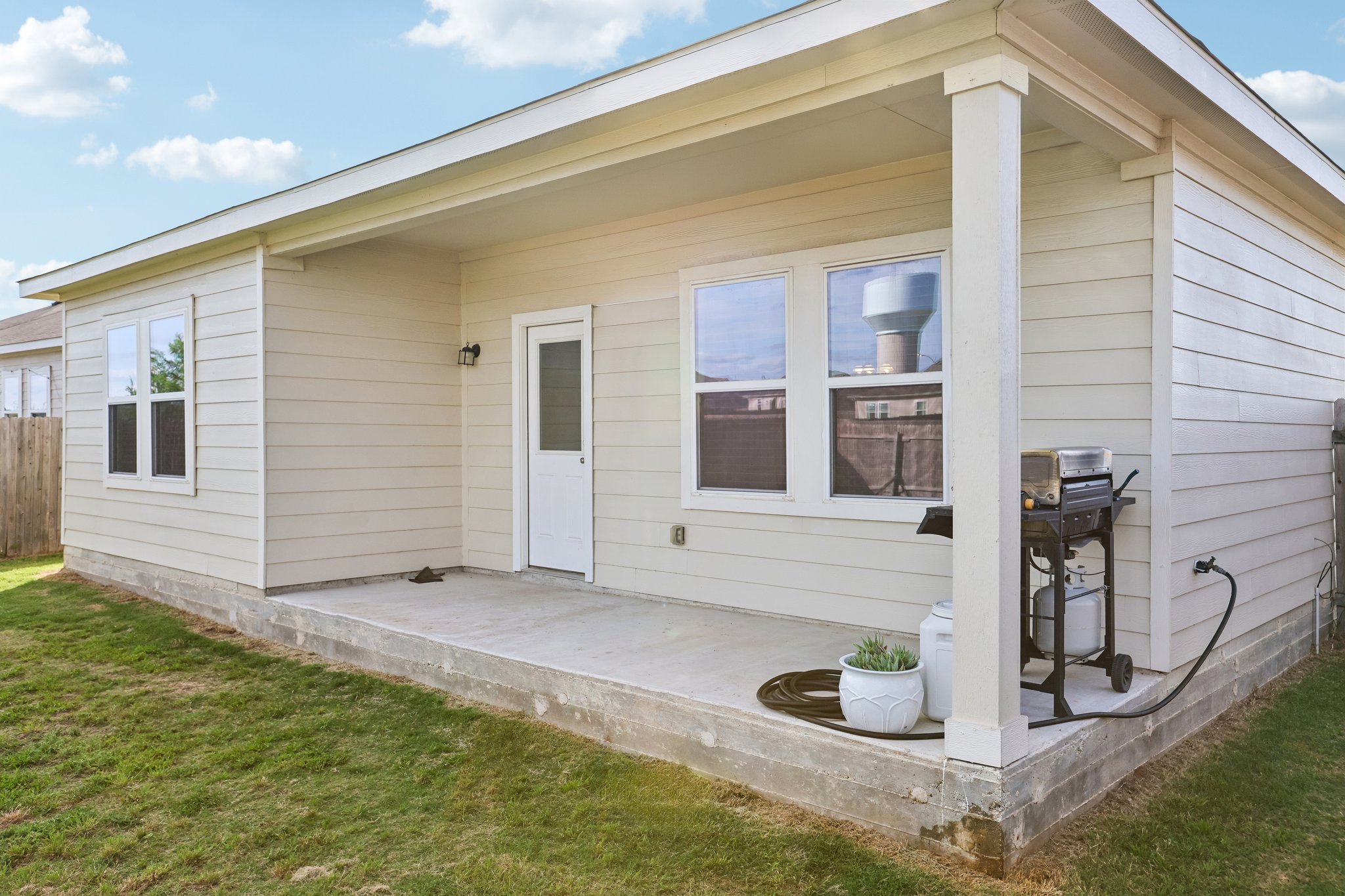 19105 Mike Mansfield Road Manor, TX 78653 - Photo 23 of 28 a view of a house with backyard