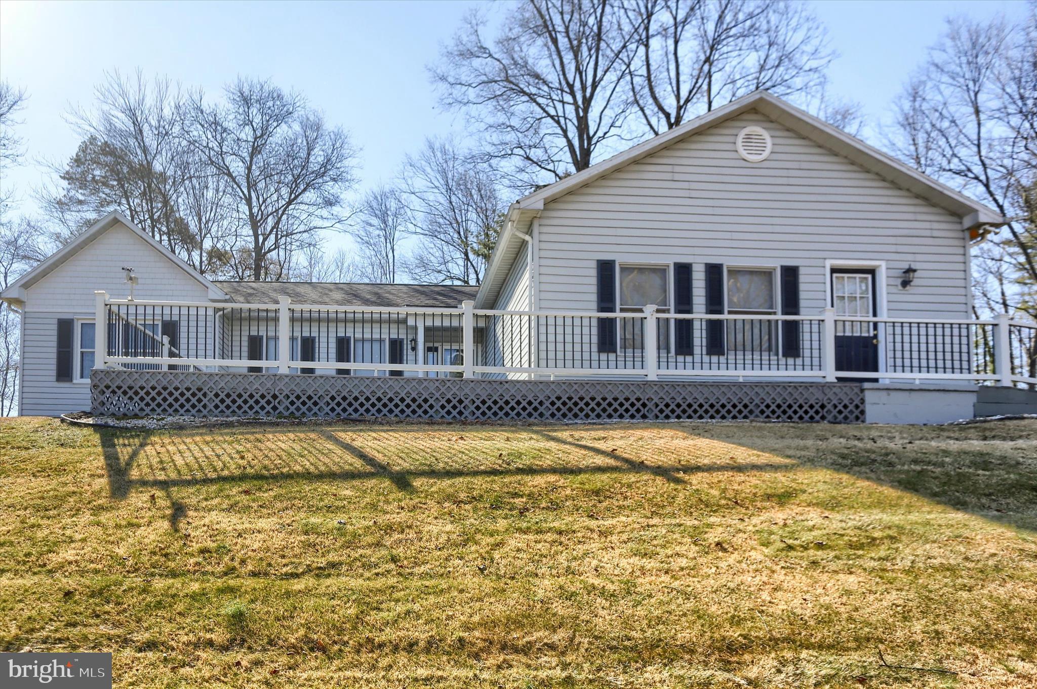 149 Stone Mountain Road Pine Grove, PA 17963 - Photo 1 of 64 a front view of a house with swimming pool and porch
