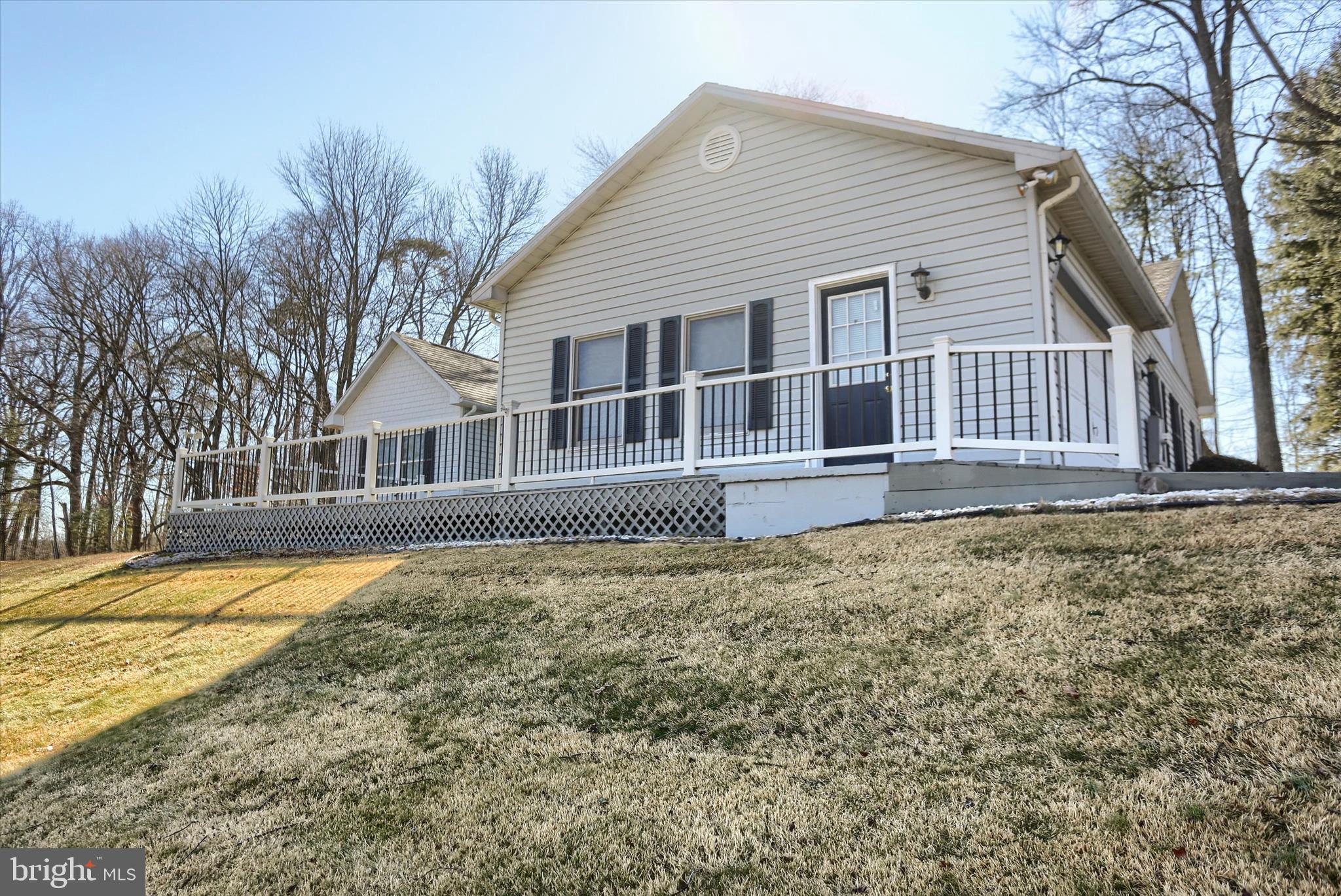 149 Stone Mountain Road Pine Grove, PA 17963 - Photo 2 of 64 a front view of a house with a yard