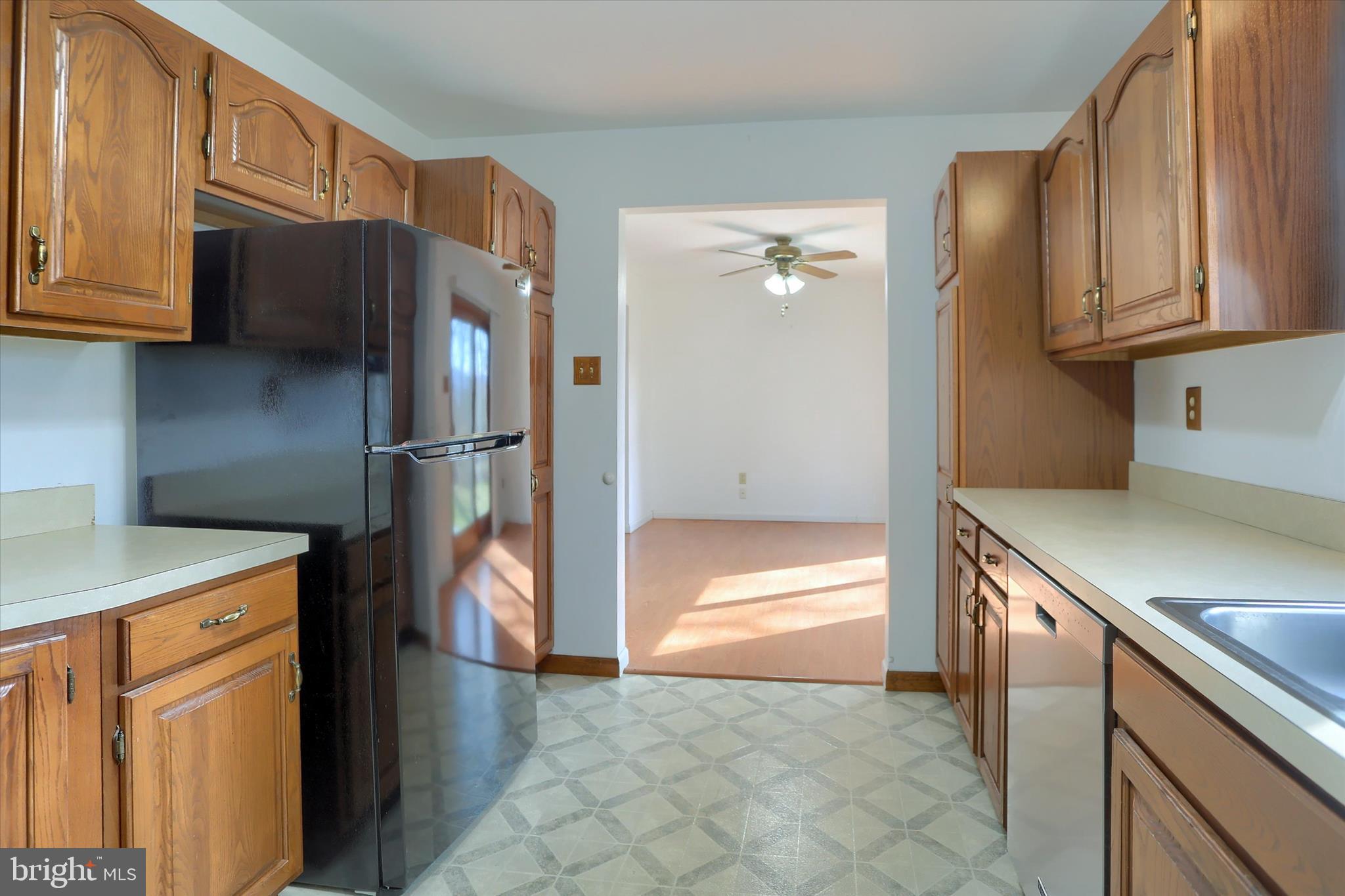 149 Stone Mountain Road Pine Grove, PA 17963 - Photo 23 of 64 a kitchen with stainless steel appliances granite countertop a refrigerator and a sink