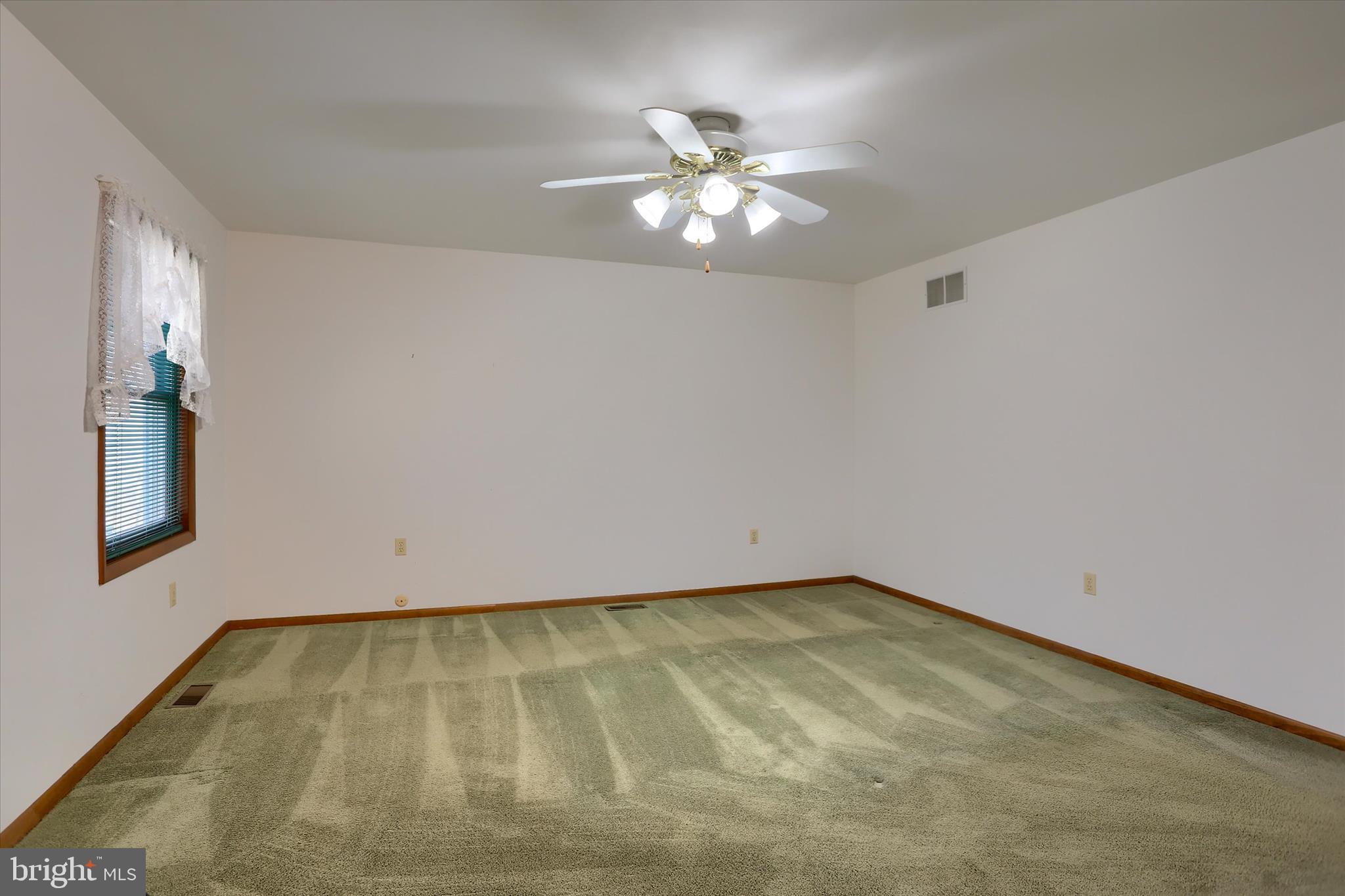 149 Stone Mountain Road Pine Grove, PA 17963 - Photo 27 of 64 a view of room with hardwood floor and ceiling fan