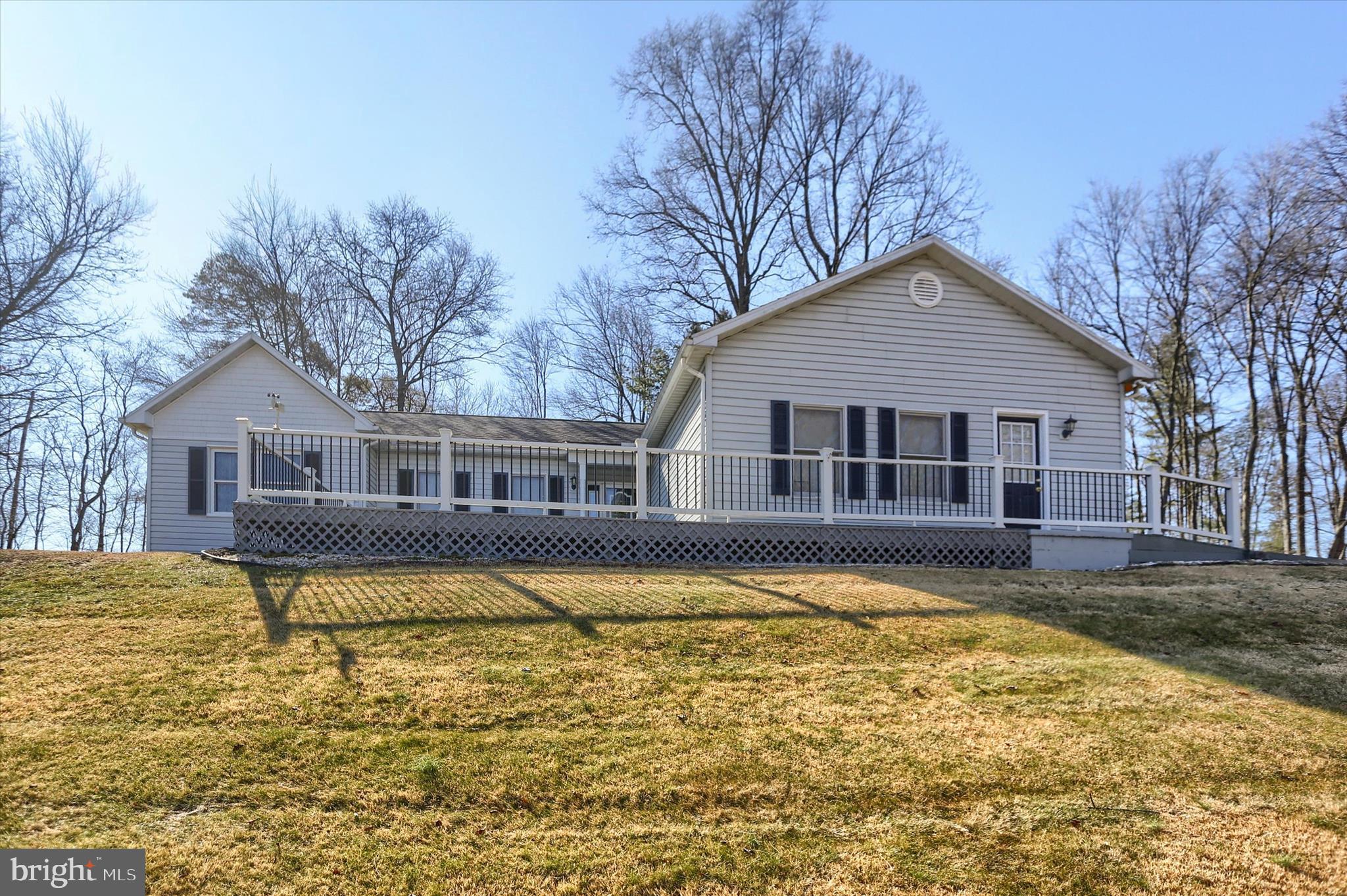 149 Stone Mountain Road Pine Grove, PA 17963 - Photo 3 of 64 a front view of a house with swimming pool and porch