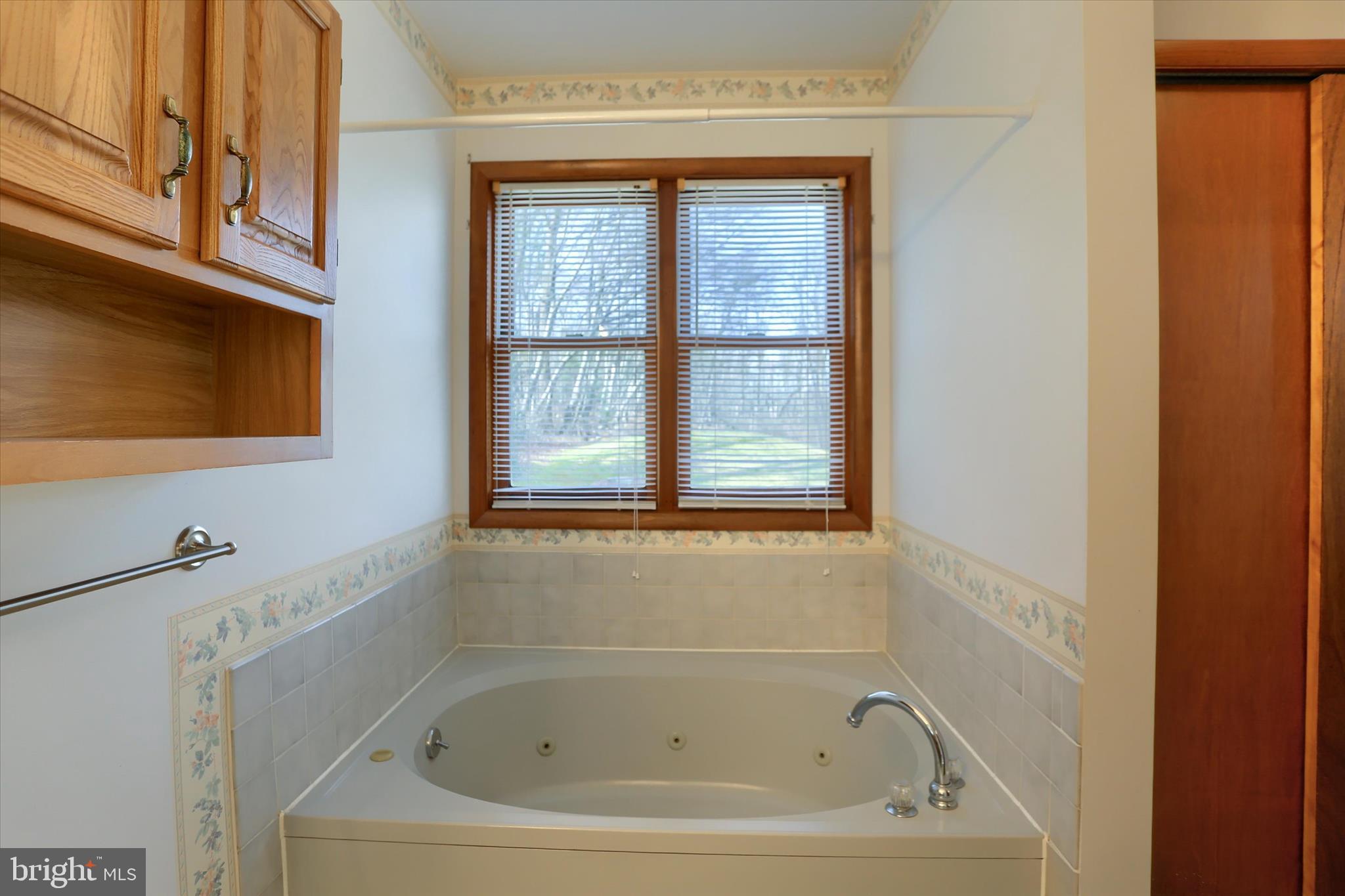 149 Stone Mountain Road Pine Grove, PA 17963 - Photo 35 of 64 a white bath tub sitting next to a window
