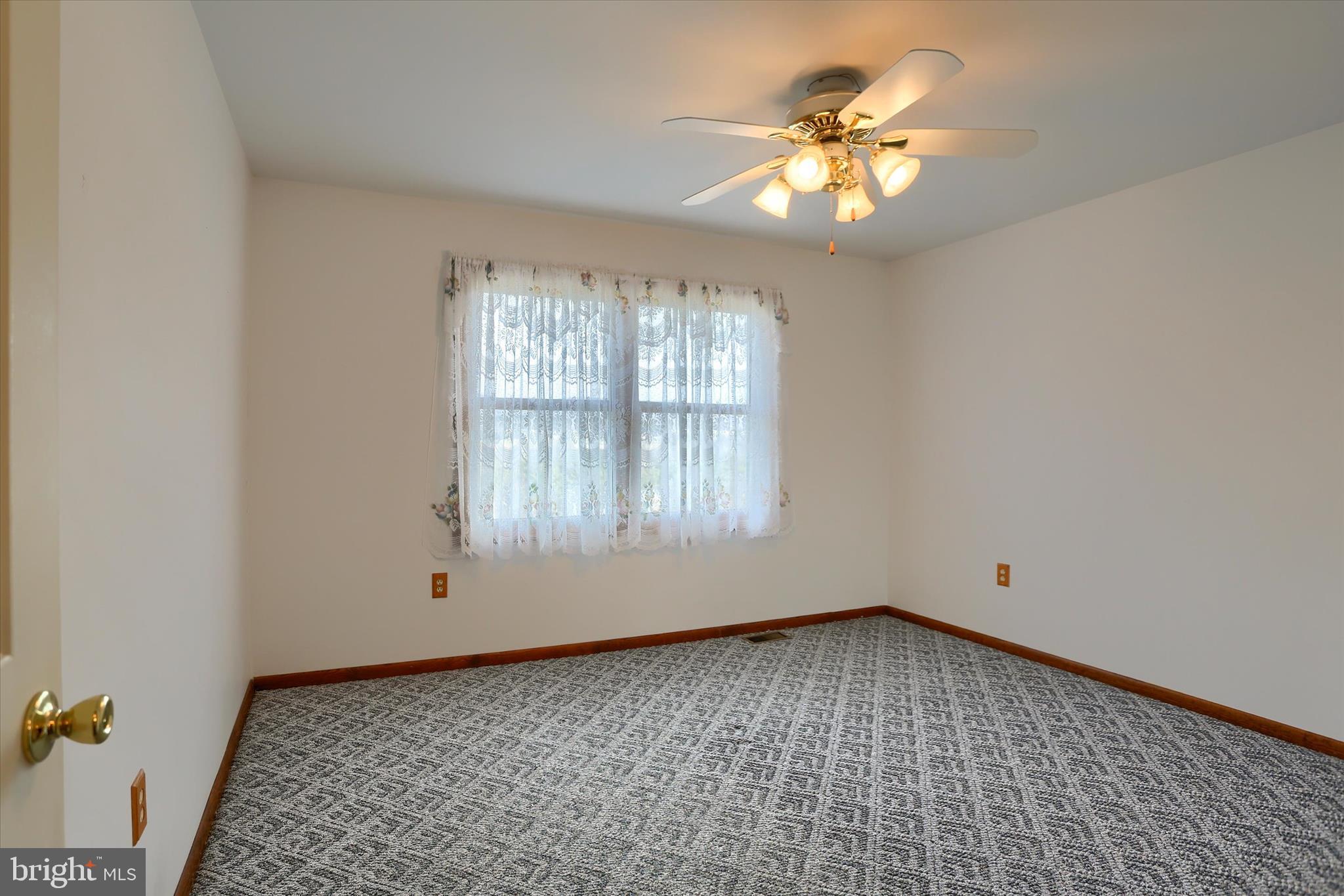 149 Stone Mountain Road Pine Grove, PA 17963 - Photo 38 of 64 wooden floor in an empty room with a window