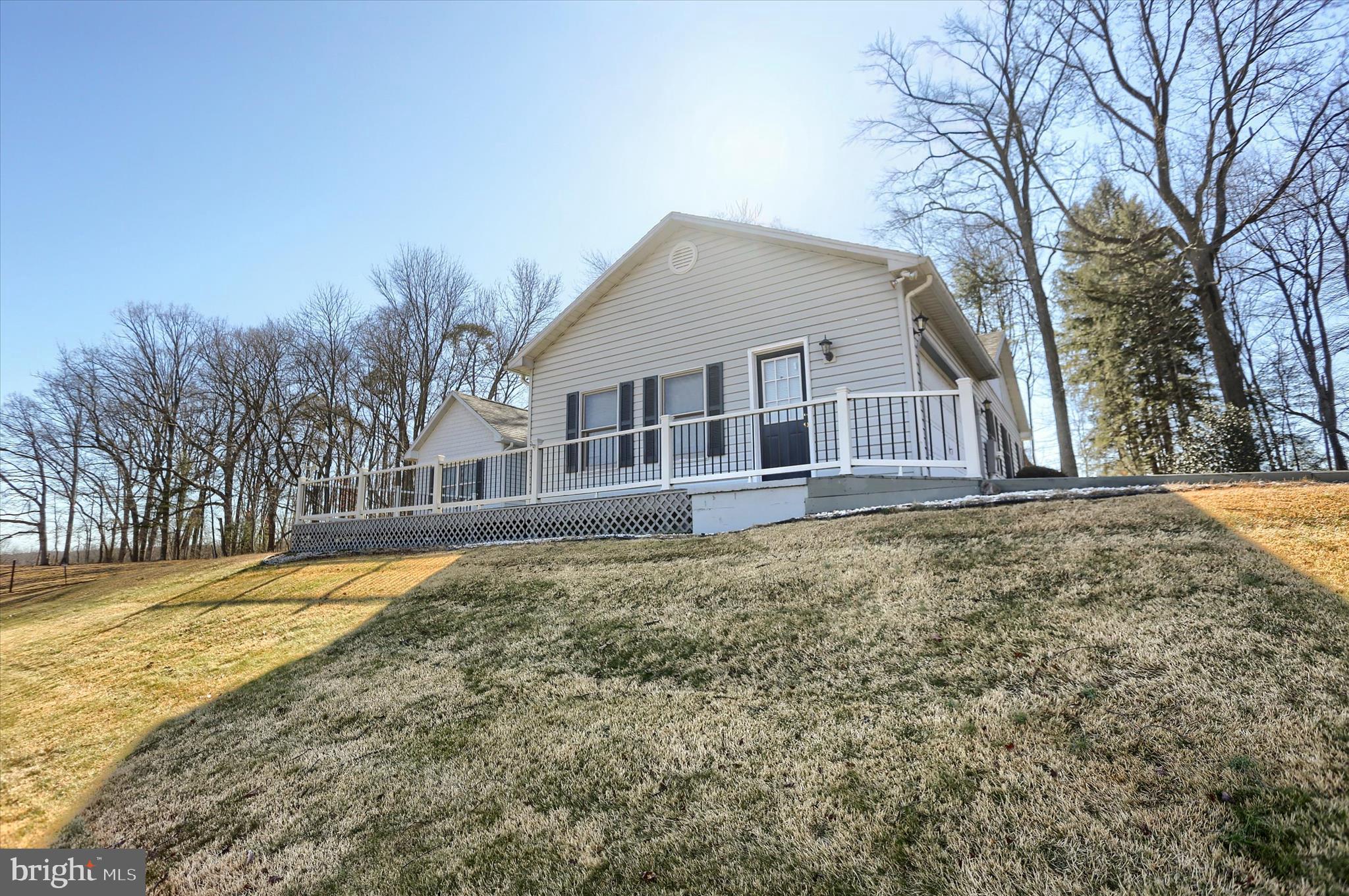 149 Stone Mountain Road Pine Grove, PA 17963 - Photo 4 of 64 a house with trees in the background