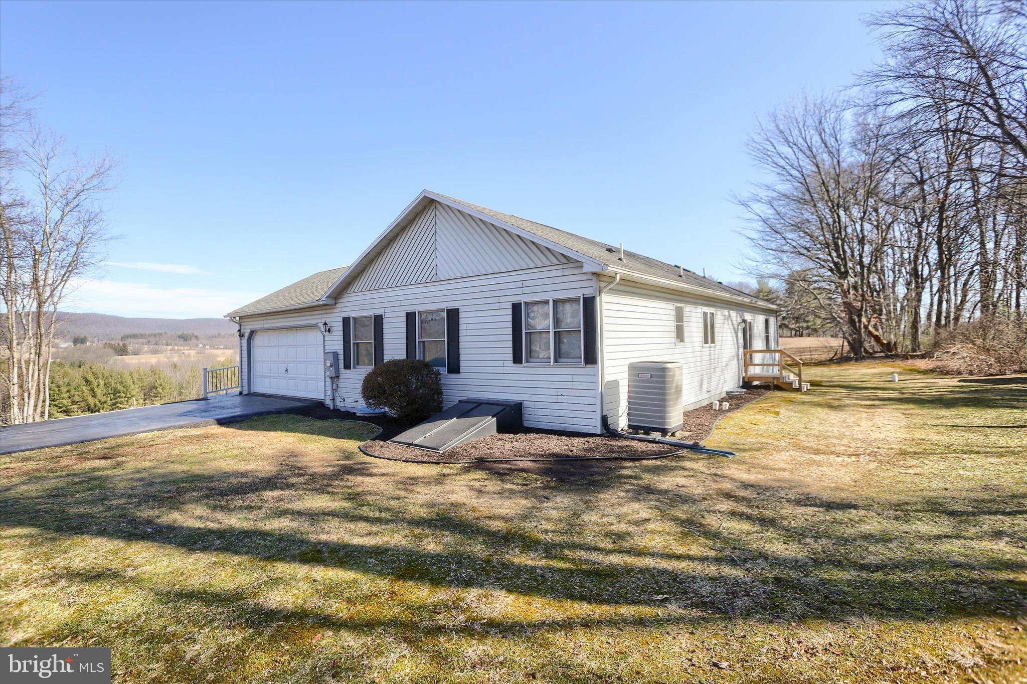 149 Stone Mountain Road Pine Grove, PA 17963 - Photo 56 of 64 a view of a house with a yard covered in snow