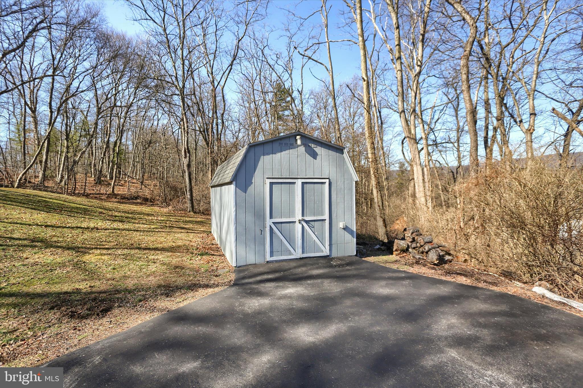 149 Stone Mountain Road Pine Grove, PA 17963 - Photo 60 of 64 a view of a house with a yard covered with snow