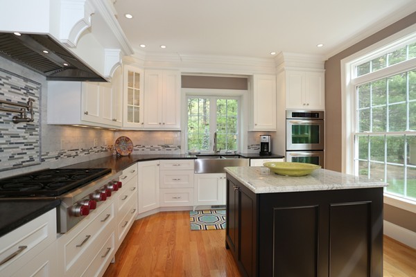 4 Marked Tree Road Sudbury, MA 01776 - Photo 6 of 27 a kitchen with a stove a sink and a cabinets