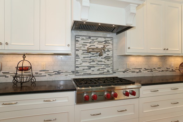 4 Marked Tree Road Sudbury, MA 01776 - Photo 9 of 27 a kitchen with a stove and cabinets