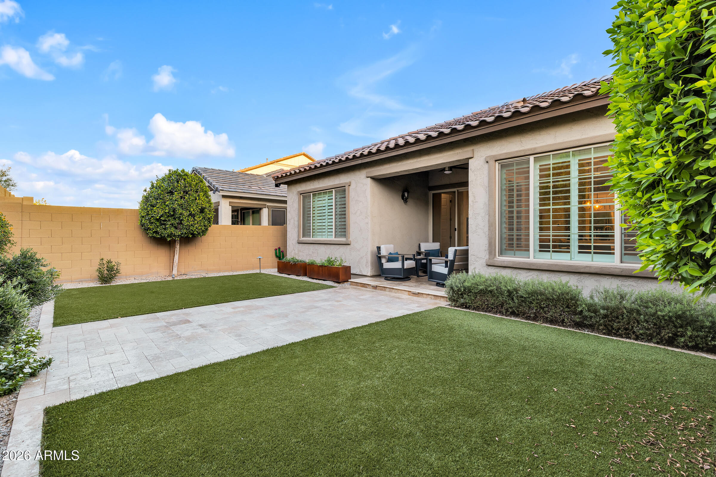622 West Deer Creek Road Phoenix, AZ 85048 - Photo 31 of 39 a front view of a house with garden