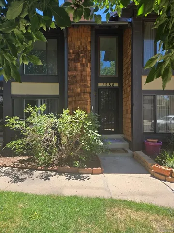 a view of a entryway door front of house