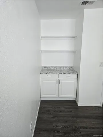 a view of a room with empty racks