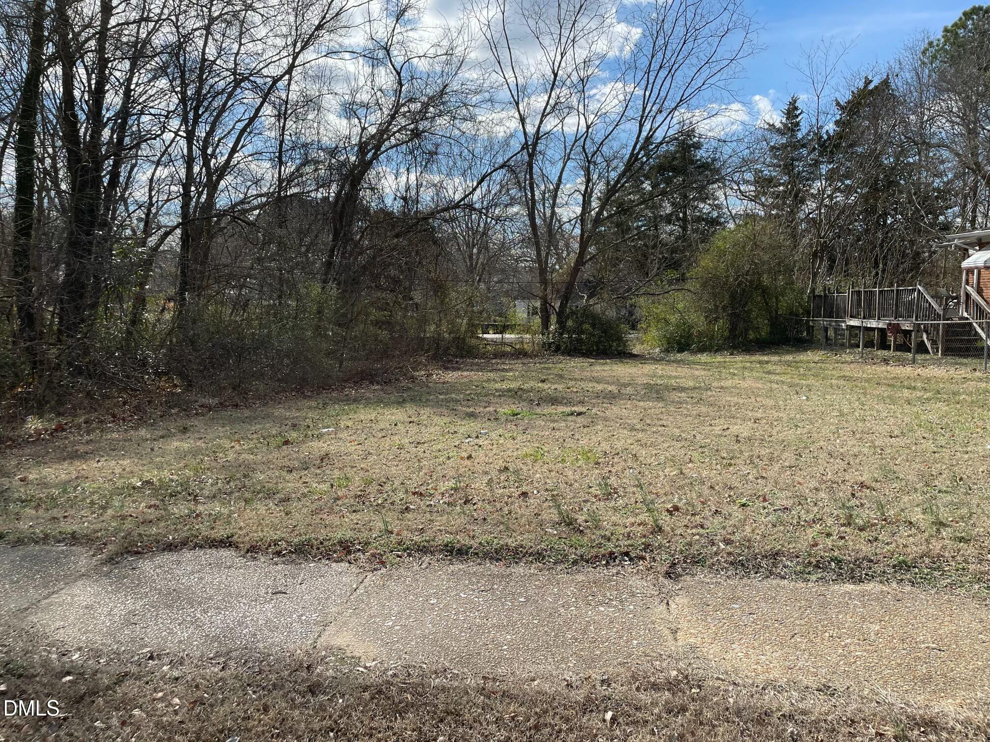 375 West Rockspring Street Henderson, NC 27536 - Photo 5 of 5 a view of a yard with trees
