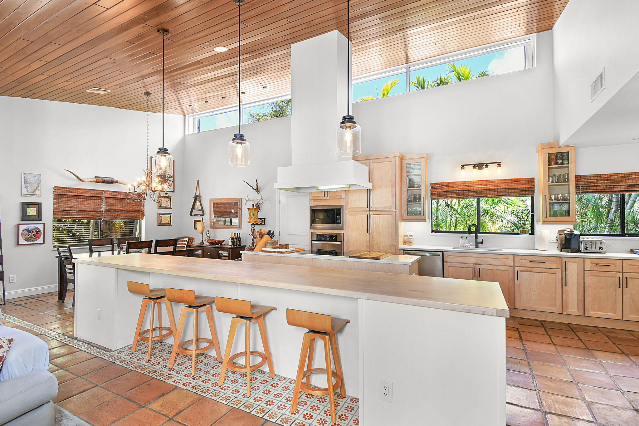 1 Riverview Drive Sewall's Point, FL 34996 - Photo 15 of 70 a large kitchen with kitchen island a large window in it