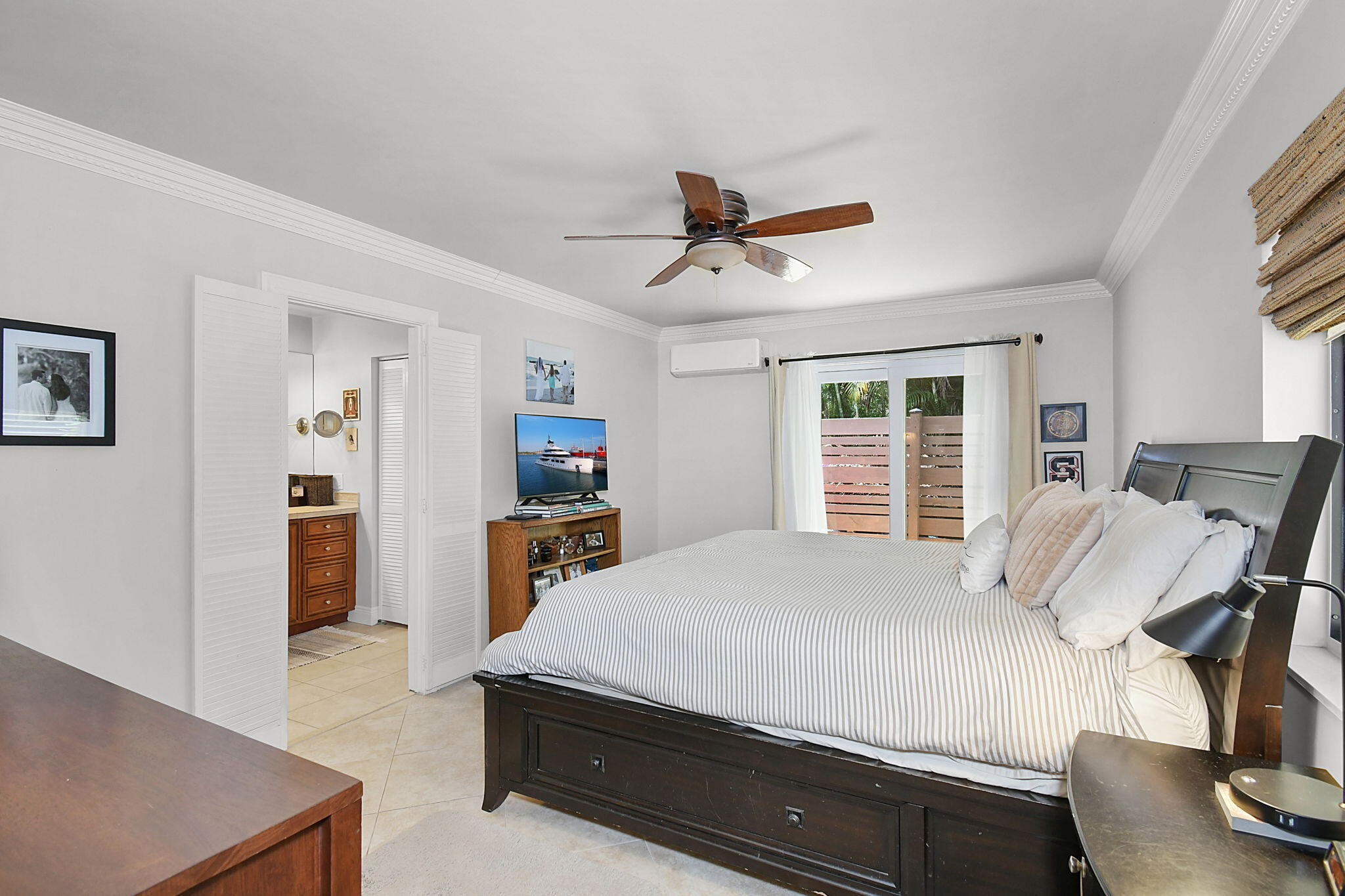 1 Riverview Drive Sewall's Point, FL 34996 - Photo 27 of 70 a bedroom with a bed and a desk