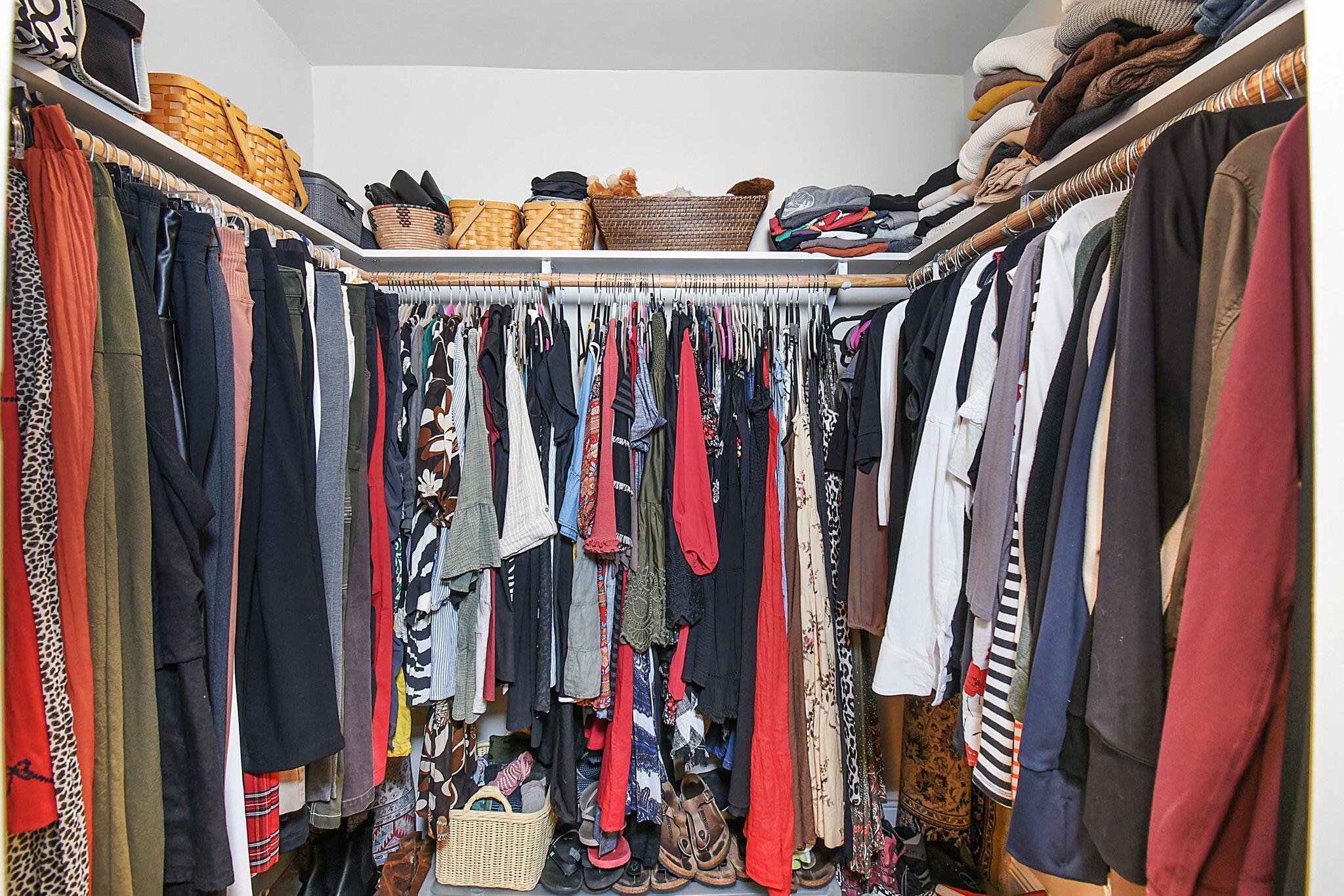 1 Riverview Drive Sewall's Point, FL 34996 - Photo 30 of 70 a view of walk in closet with clothes