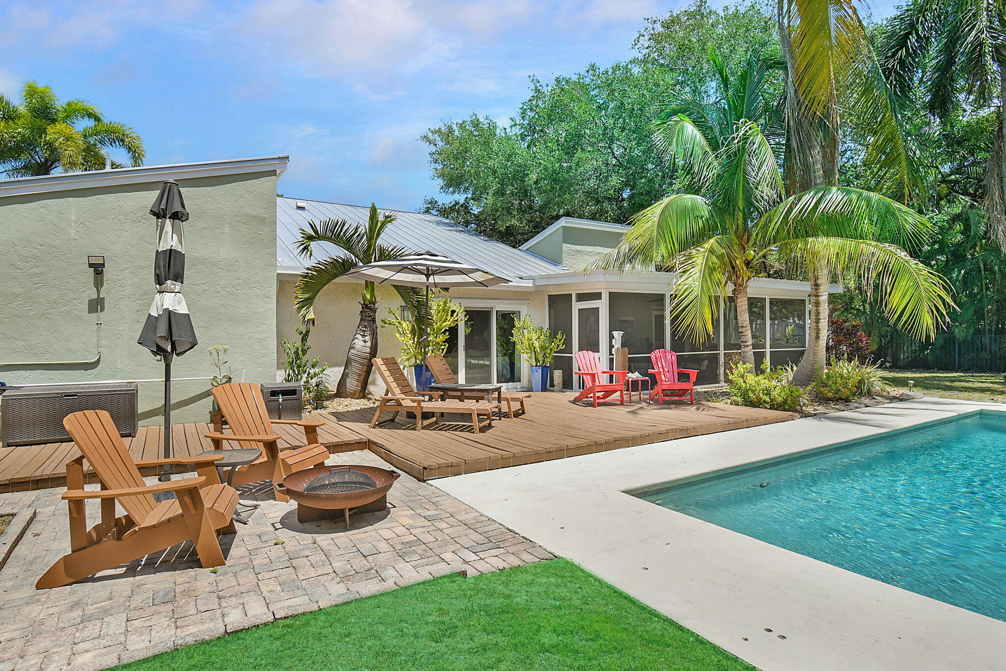 1 Riverview Drive Sewall's Point, FL 34996 - Photo 47 of 70 a view of a house with backyard and sitting area