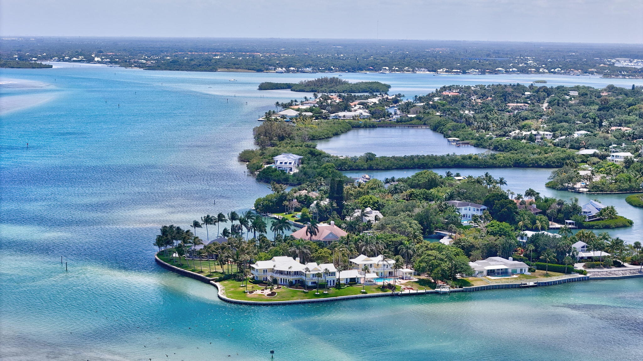 1 Riverview Drive Sewall's Point, FL 34996 - Photo 66 of 70 an aerial view of a house with a lake view