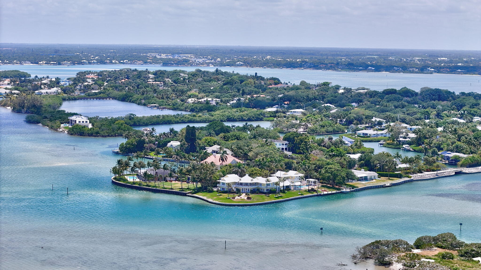 1 Riverview Drive Sewall's Point, FL 34996 - Photo 69 of 70 an aerial view of a houses with a lake view
