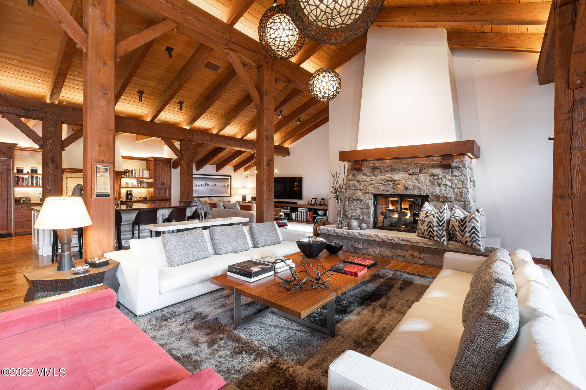 400 Vail Valley Drive, Unit 9 Vail, CO 81657 - Photo 1 of 39 a living room with furniture and a fireplace