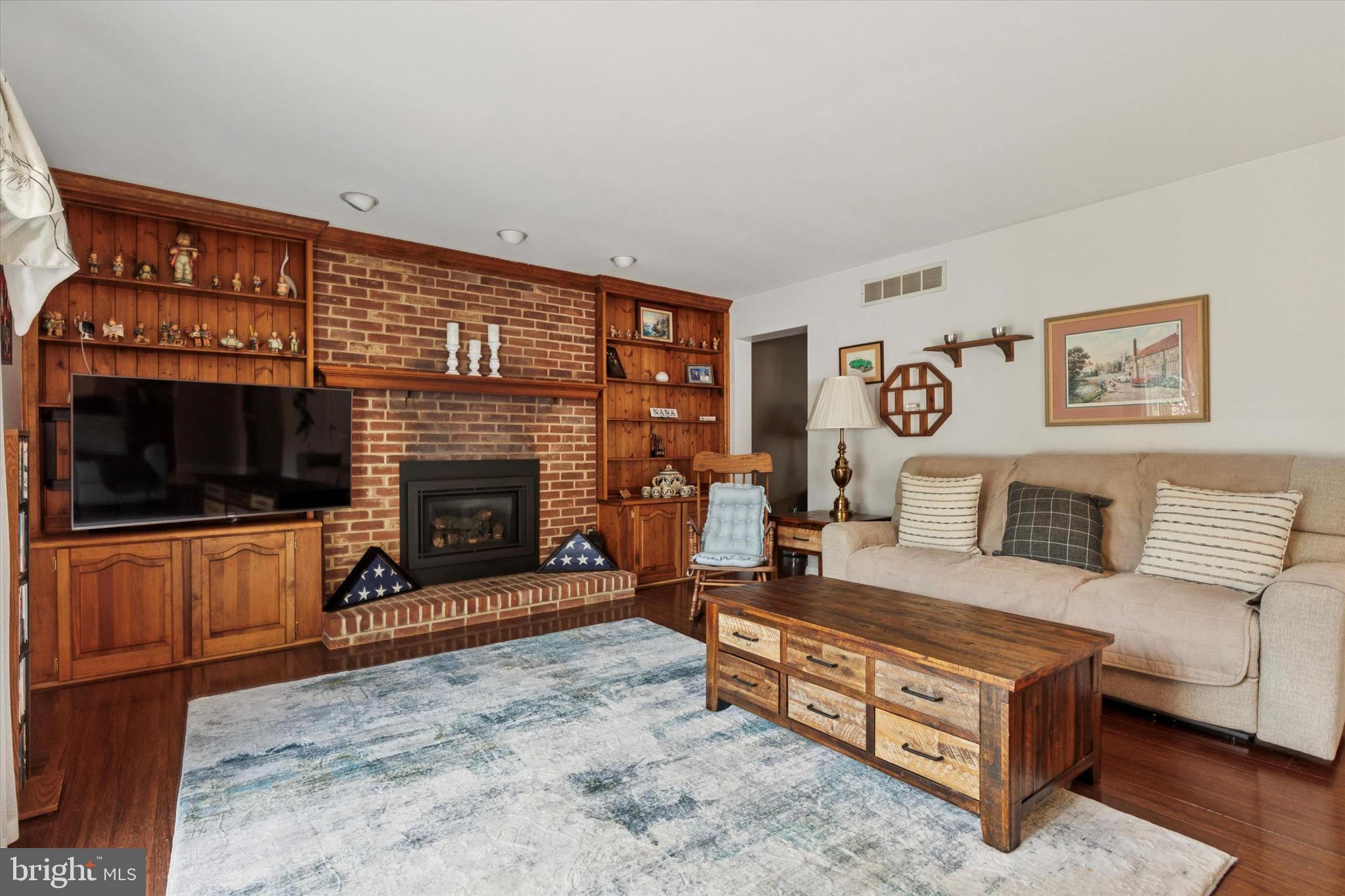 689 Pickering Road Southampton, PA 18966 - Photo 8 of 35 Family room with brick fireplace