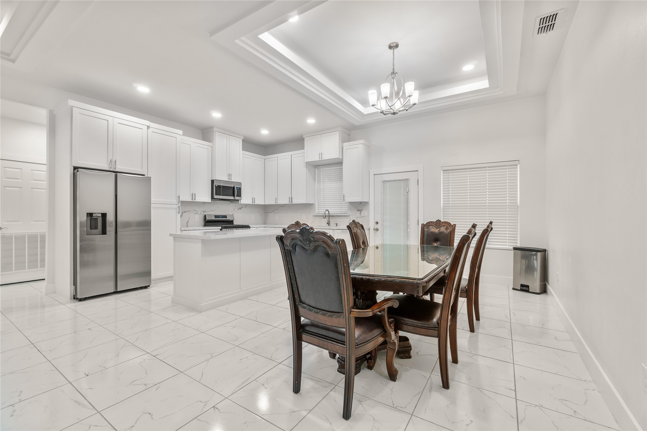 23232 Val Verde Edcouch, TX 78538 - Photo 15 of 19 a view of kitchen with refrigerator dining table and chairs