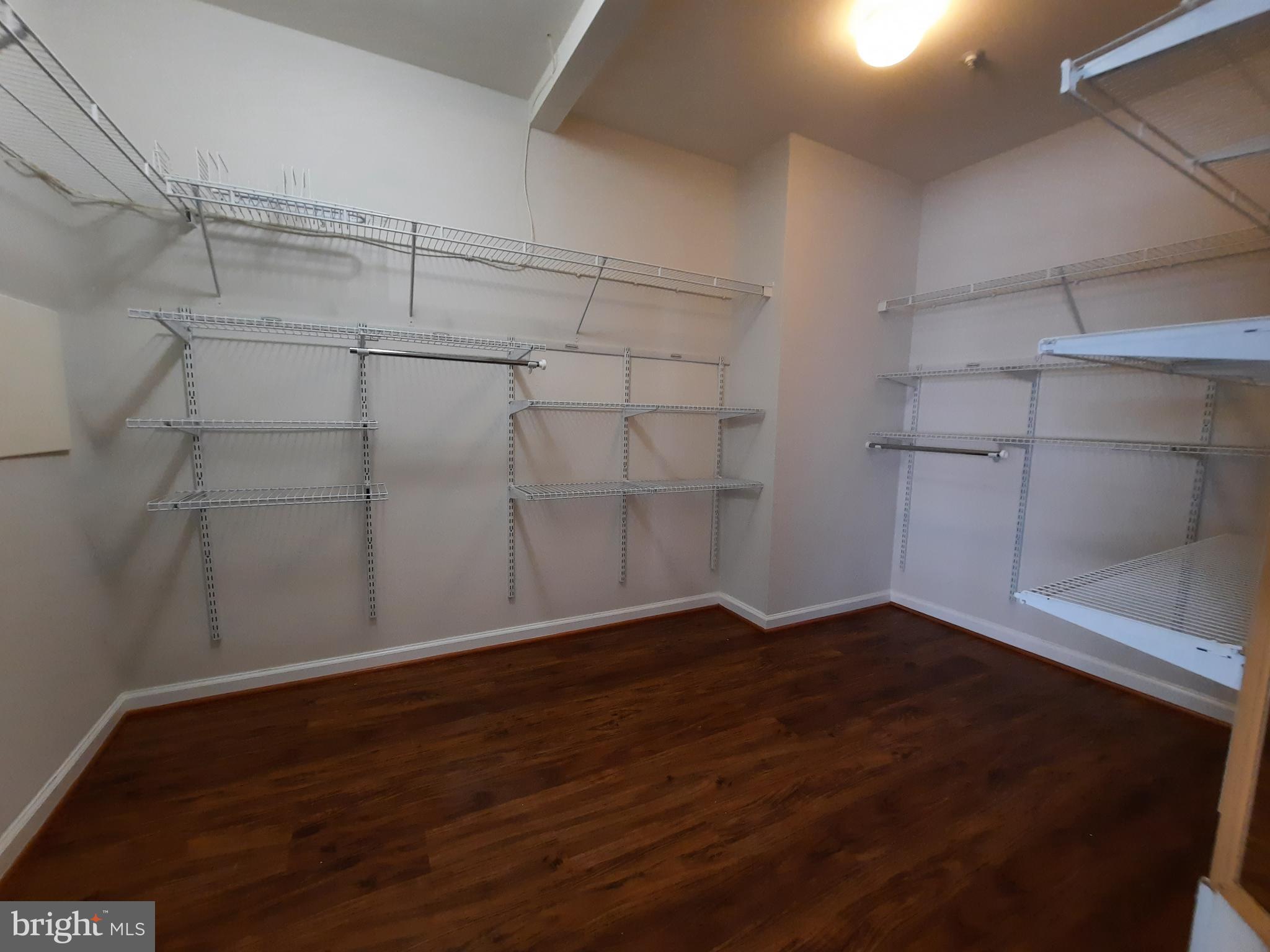 10258 Rutland Round Road, Unit 13 Columbia, MD 21044 - Photo 26 of 46 a view of a room with empty racks