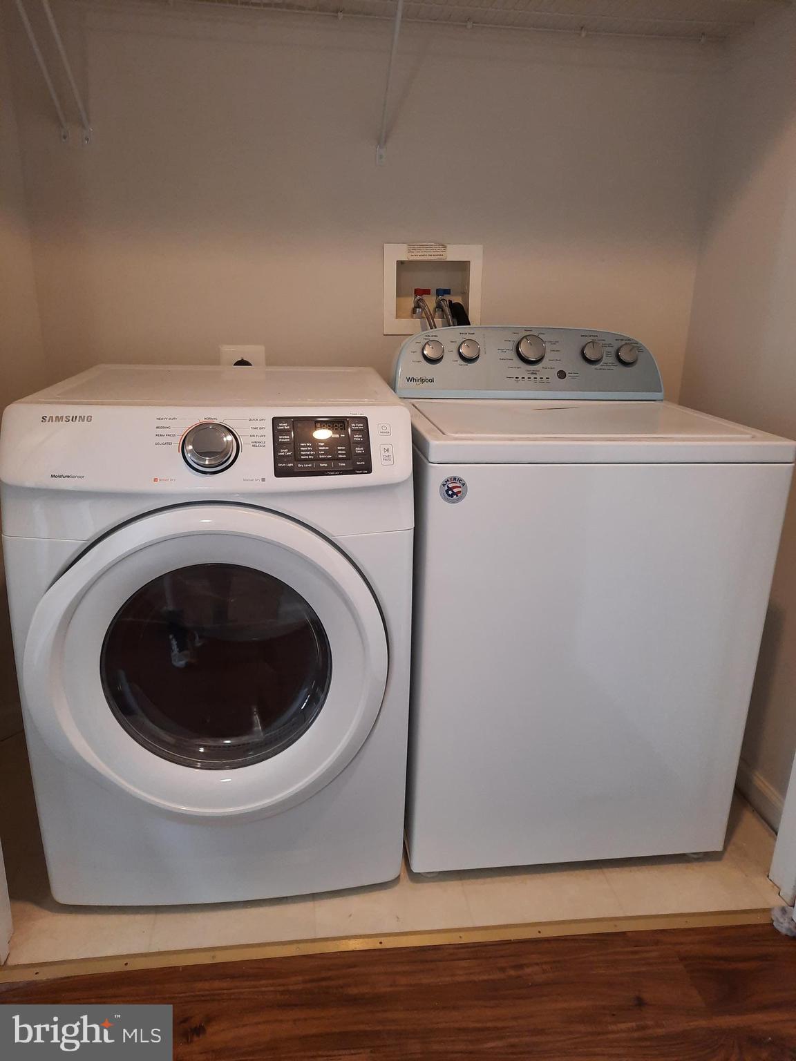 10258 Rutland Round Road, Unit 13 Columbia, MD 21044 - Photo 34 of 46 a utility room with dryer and washer