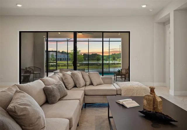 a white bath tub sitting next to a white toilet and a sink