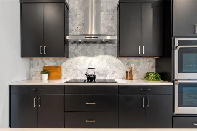 a view of a livingroom with a ceiling fan and window