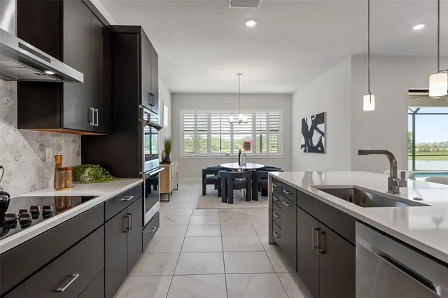 a view of an empty room with a ceiling fan