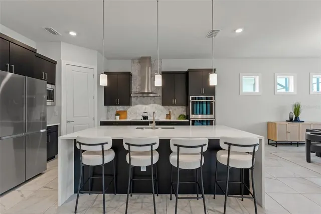 a bathroom with a bathtub a toilet and a shower
