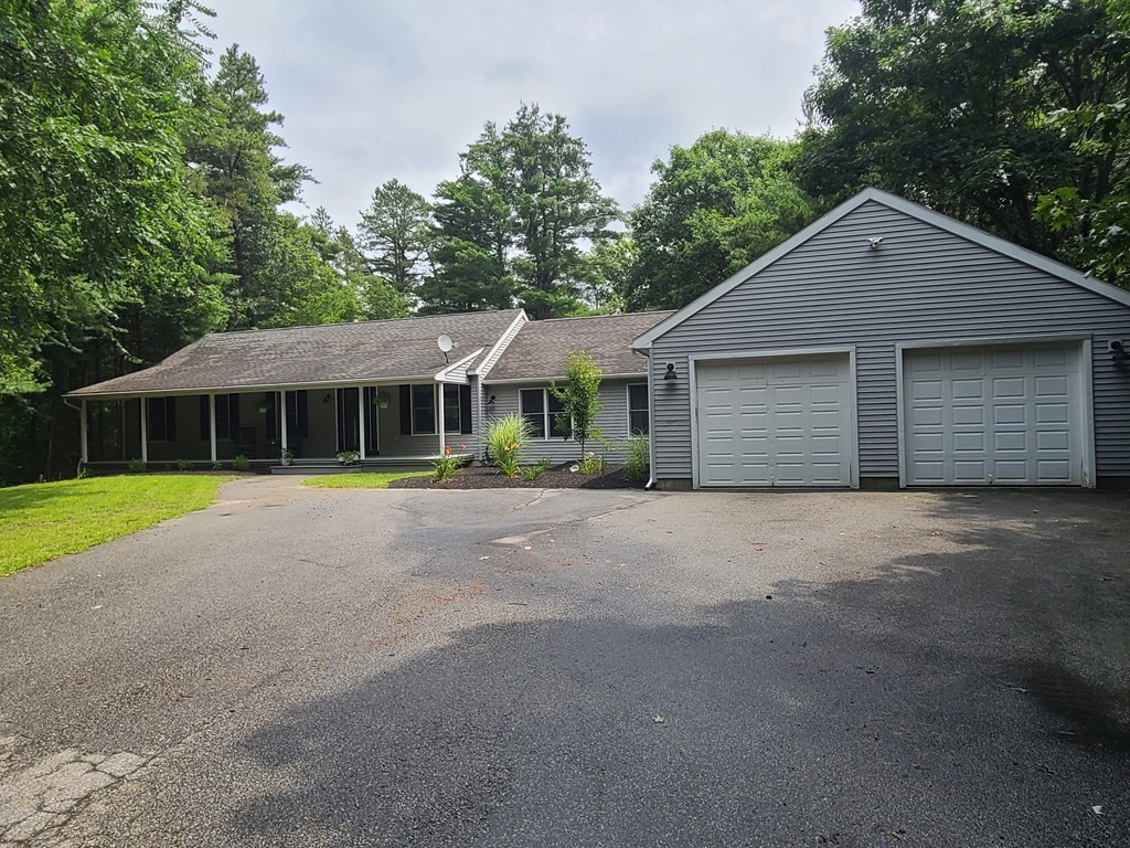 123 Boston Road Palmer, MA 01069 - Photo 1 of 33 a front view of house with yard and green space