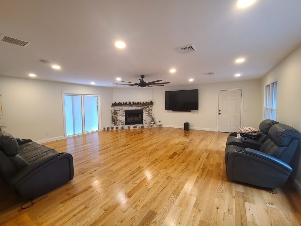 123 Boston Road Palmer, MA 01069 - Photo 10 of 33 a living room with furniture and a flat screen tv