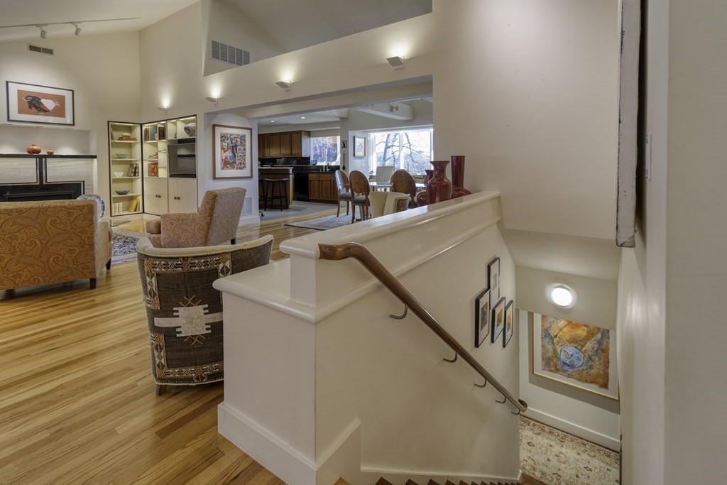37 Beverly Road Arlington, MA 02474 - Photo 23 of 42 a view of a hallway with workspace and wooden floor
