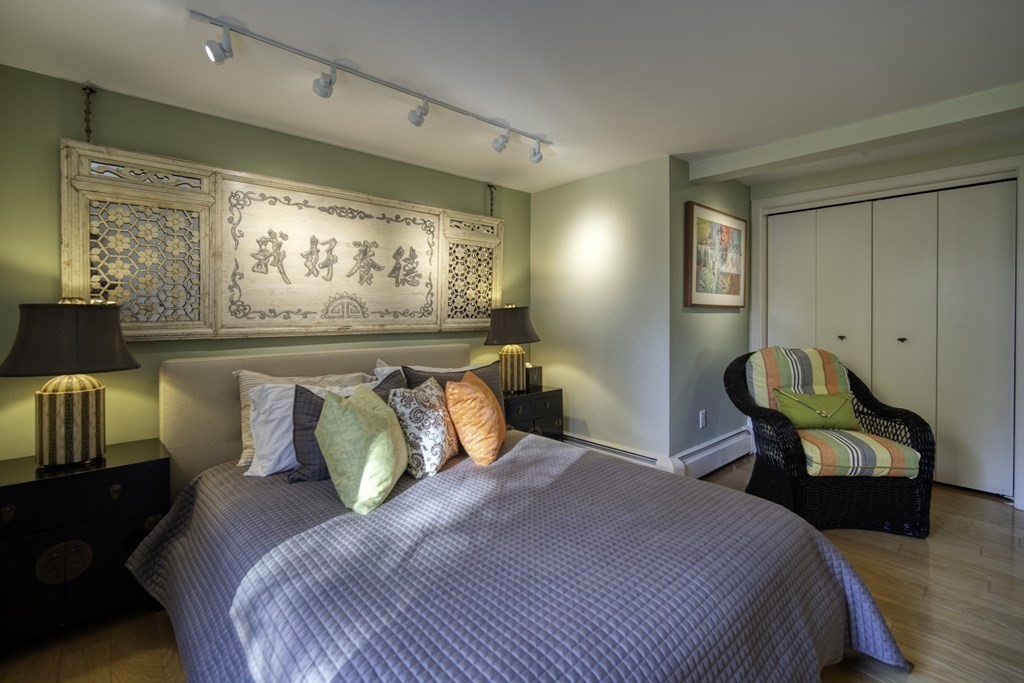 37 Beverly Road Arlington, MA 02474 - Photo 26 of 42 a bedroom with a bed a couch and dresser