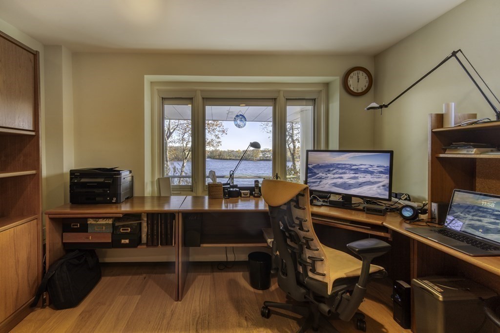 37 Beverly Road Arlington, MA 02474 - Photo 28 of 42 a room with furniture gym equipment and a flat screen tv