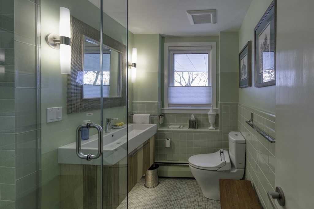 37 Beverly Road Arlington, MA 02474 - Photo 29 of 42 a bathroom with a sink a toilet and shower